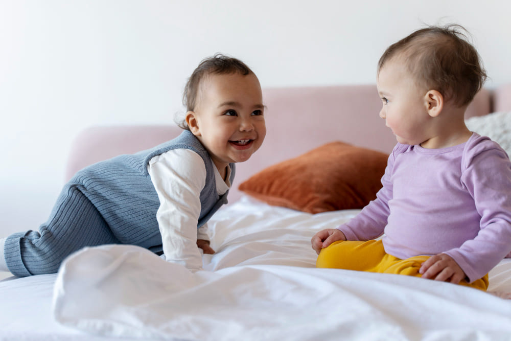 Mellizos en la cama